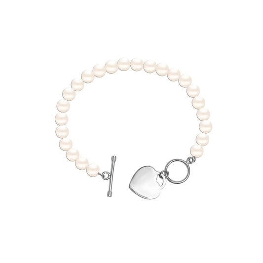 Pulsera de perlas con detalle en forma de corazón