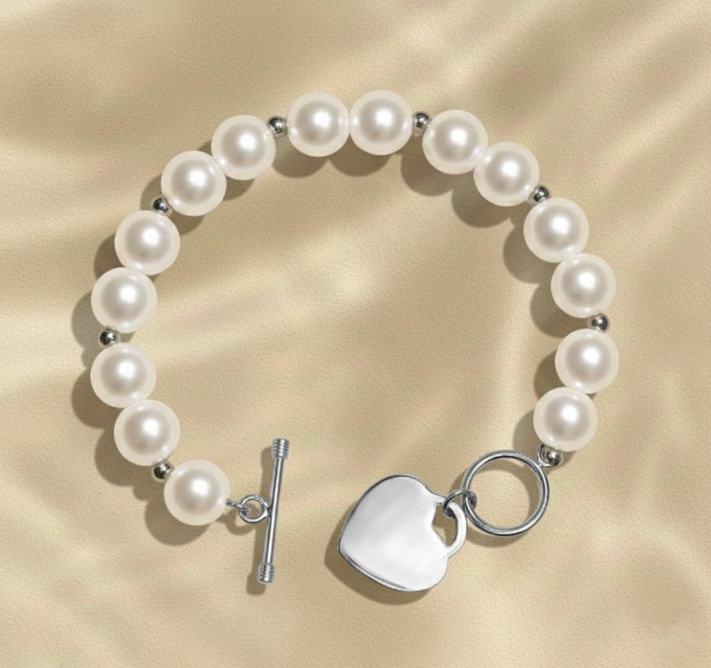 Pulsera de Perlas con Detalle Corazón – Joyas 24/7 | Minimalismo con Carácter