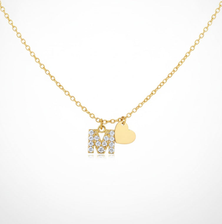 Collar letra M baño en oro con circonitas blancas