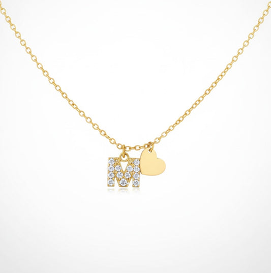 Collar letra M baño en oro con circonitas blancas